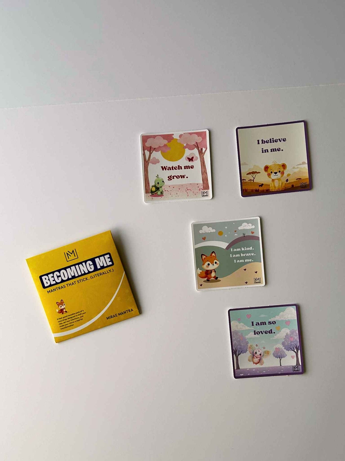 Set of four growth affirmations for kids mirror stickers from the Mirae Mantra Kids Becoming Me Pack with packaging