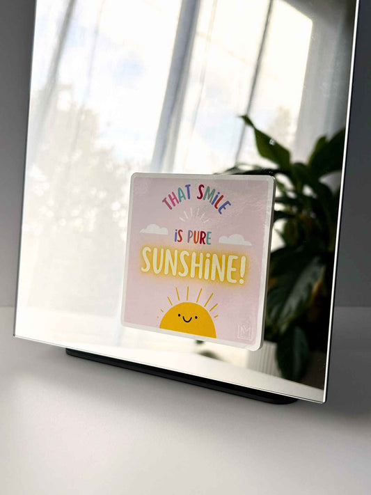 Kids confidence affirmation sticker featuring a smiling sun and the phrase “That smile is pure sunshine”