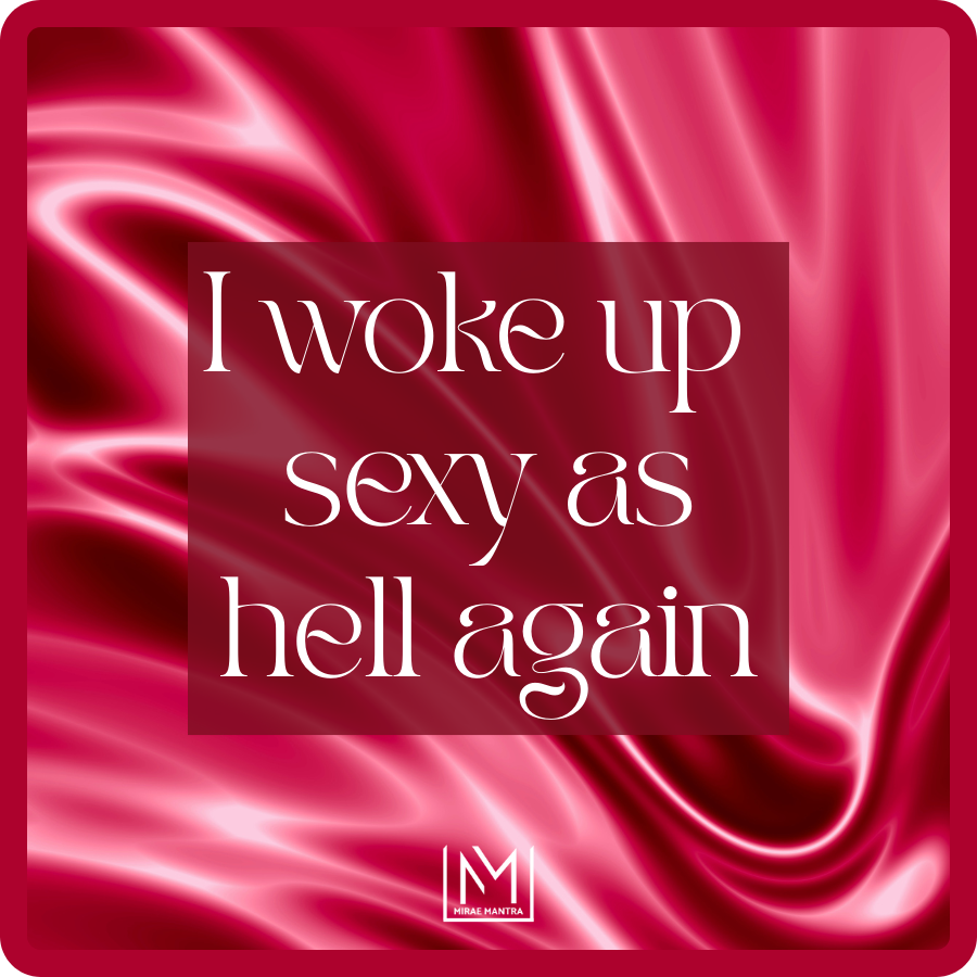 Pink fabric background with text 'I woke up sexy as hell again' and a logo in the corner. Mirae Mantra mirror affirmation sticker