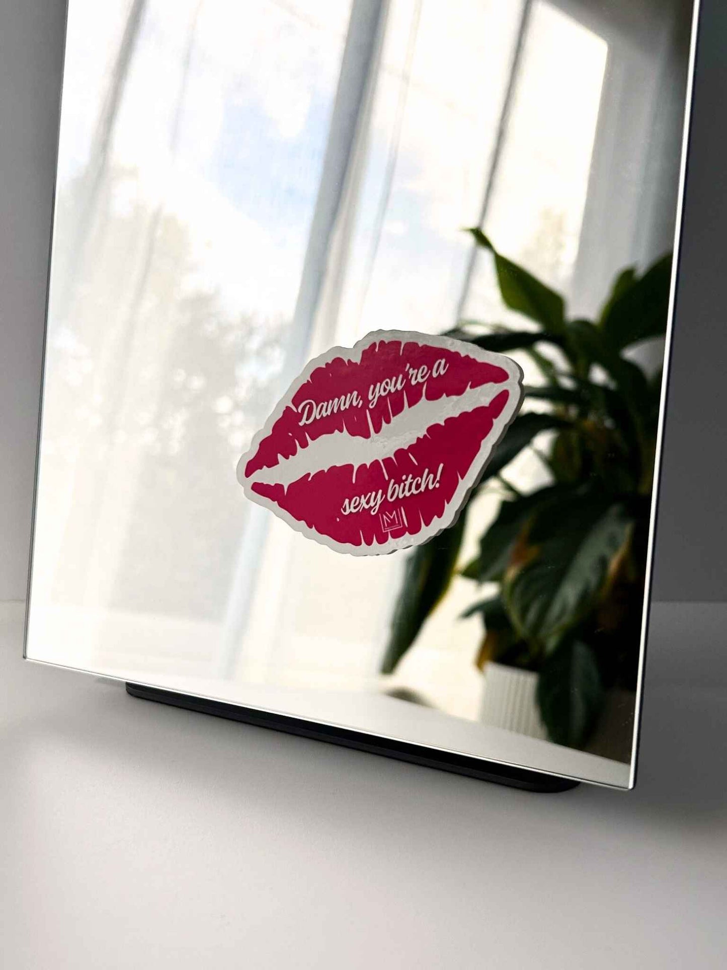 Pink lipstick design self-love mirror sticker that reads “Damn you’re a sexy bitch”