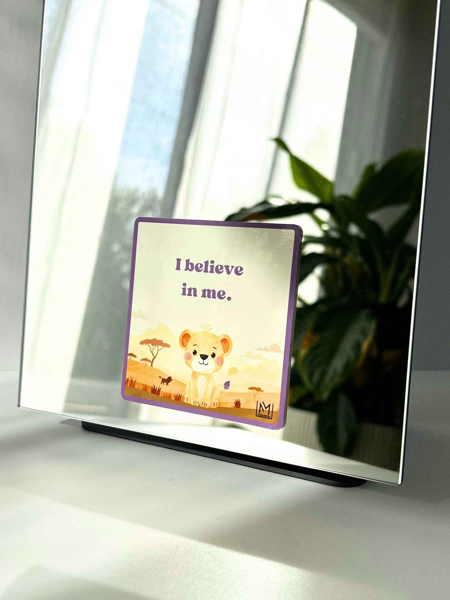 Kids growth affirmation mirror sticker with a lion illustration and the words “I believe in me”