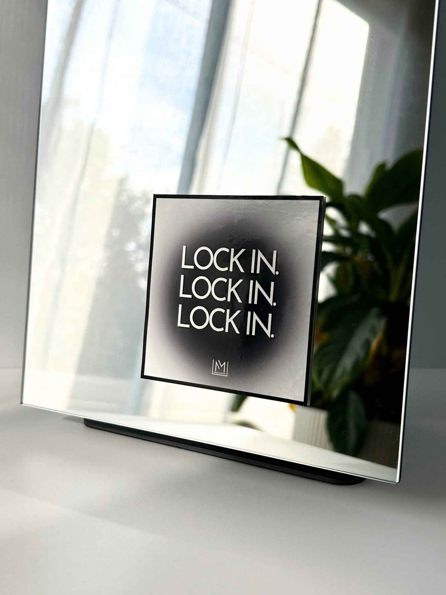 Minimal focus affirmation sticker with bold “Lock in.” text