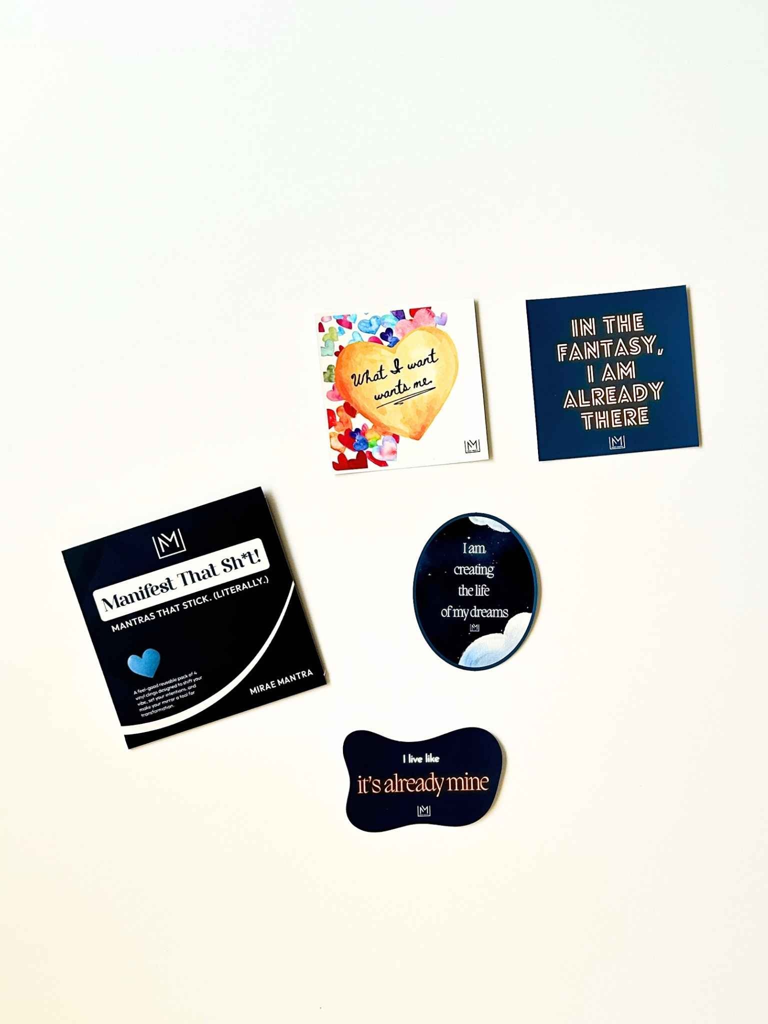 Four-piece set of mirror manifestation affirmations from the Manifest That Sh*t Pack with packaging